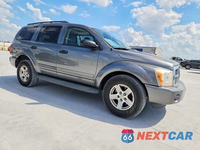 Czwarte zdjęcie samochodu z boku: 2005 DODGE DURANGO SLT VIN:1D4HB48D05F513445 - miniatura