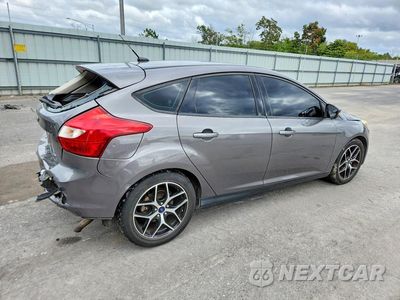Trzecie zdjęcie samochodu z tyłu: 2013 FORD FOCUS SE VIN:1FADP3K22DL128960 - miniatura