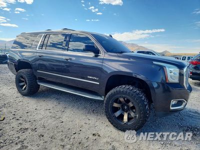 Czwarte zdjęcie samochodu z boku: 2016 GMC YUKON XL DENALI VIN:1GKS2HKJ5GR271542 - miniatura