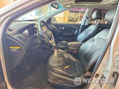 Zdjęcie 7 z 13 samochodu: 2013 HYUNDAI TUCSON LIMITED VIN:KM8JUCAC8DU745141 - miniatura