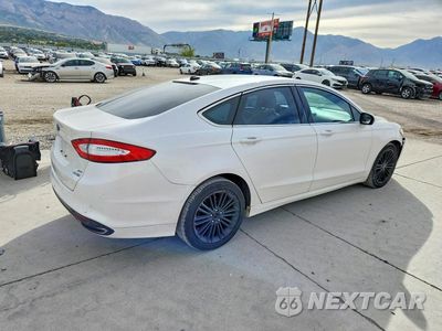 Trzecie zdjęcie samochodu z tyłu: 2016 FORD FUSION SE VIN:3FA6P0T94GR122859 - miniatura