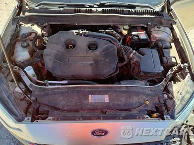 Zdjęcie 11 z 12 samochodu: 2017 FORD FUSION TITANIUM VIN:3FA6P0K92HR220341 - miniatura