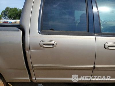 Zdjęcie 10 z 12 samochodu: 2003 FORD F150 SUPERCREW VIN:1FTRW07623KB91400 - miniatura