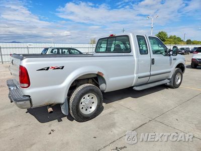Trzecie zdjęcie samochodu z tyłu: 1999 FORD F250 SUPER DUTY VIN:1FTNX21S3XED89615 - miniatura