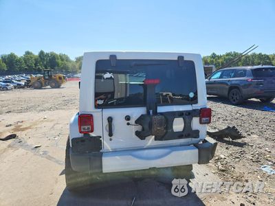 Zdjęcie 6 z 12 samochodu: 2012 JEEP WRANGLER UNLIMITED SAHARA VIN:1C4BJWEG4CL263559 - miniatura