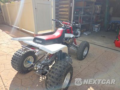Czwarte zdjęcie samochodu z boku: 2000 Yamaha Banshee 350 ATV VIN:JY43GG03XYA010180 - miniatura