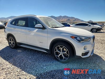 Czwarte zdjęcie samochodu z boku: 2017 BMW X1 XDRIVE28I VIN:WBXHT3C37H5F80725 - miniatura