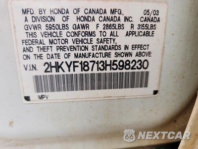 Zdjęcie 13 z 13 samochodu: 2003 HONDA PILOT EXL VIN:2HKYF18713H598230 - miniatura