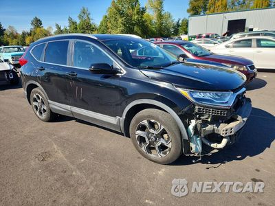 Czwarte zdjęcie samochodu z boku: 2018 HONDA CR-V TOURING VIN:2HKRW2H91JH677955 - miniatura