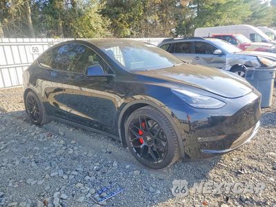 Czwarte zdjęcie samochodu z boku: 2021 TESLA MODEL Y VIN:5YJYGDEF2MF202008 - miniatura