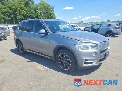 Czwarte zdjęcie samochodu z boku: 2018 BMW X5 XDR40E VIN:5UXKT0C50J0V98064 - miniatura