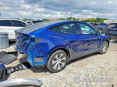 Trzecie zdjęcie samochodu z tyłu: 2023 TESLA MODEL Y VIN:7SAYGAEE8PF801427 - miniatura