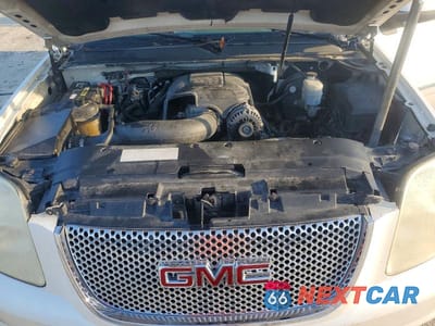 Zdjęcie 12 z 13 samochodu: 2009 GMC YUKON XL DENALI VIN:1GKFC06239R269827 - miniatura
