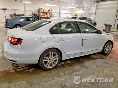 Trzecie zdjęcie samochodu z tyłu: 2017 VOLKSWAGEN JETTA SEL VIN:3VWL17AJ1HM338930 - miniatura