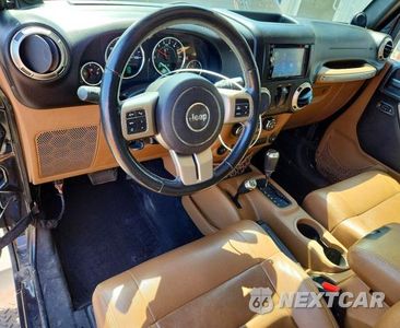 Zdjęcie 8 z 12 samochodu: 2011 JEEP WRANGLER SPORT VIN:1J4GA2D12BL634156 - miniatura