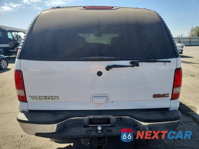 Zdjęcie 6 z 13 samochodu: 2002 GMC YUKON VIN:1GKEK13Z82R169377 - miniatura
