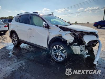 Czwarte zdjęcie samochodu z boku: 2018 TOYOTA RAV4 HYBRID XLE VIN:JTMRJREV8JD252084 - miniatura