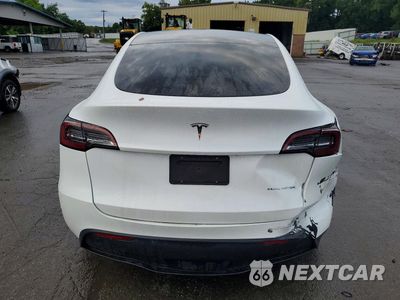 Zdjęcie 6 z 12 samochodu: 2024 TESLA MODEL Y VIN:7SAYGAEE5RF161390 - miniatura