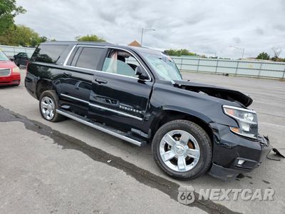 Czwarte zdjęcie samochodu z boku: 2018 CHEVROLET SUBURBAN K1500 LT VIN:1GNSKHKCHJR325685 - miniatura