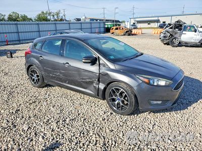 Czwarte zdjęcie samochodu z boku: 2017 FORD FOCUS SEL VIN:1FADP3M20HL253684 - miniatura