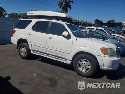 Czwarte zdjęcie samochodu z boku: 2001 TOYOTA SEQUOIA LIMITED VIN:5TDZT38A31S029424 - miniatura