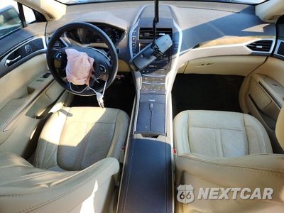 Zdjęcie 8 z 12 samochodu: 2015 LINCOLN MKZ VIN:3LN6L2GK6FR622238 - miniatura