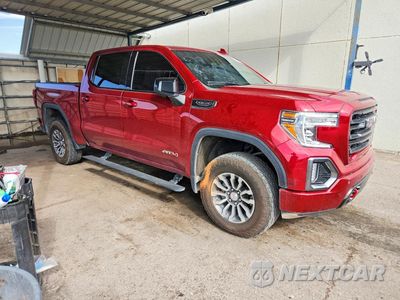Czwarte zdjęcie samochodu z boku: 2021 GMC SIERRA K1500 AT4 VIN:3GTP9EEDXMG308419 - miniatura