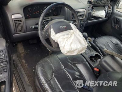 Zdjęcie 8 z 13 samochodu: 2001 JEEP GRAND CHEROKEE LAREDO VIN:1J4GW48SX1C661877 - miniatura