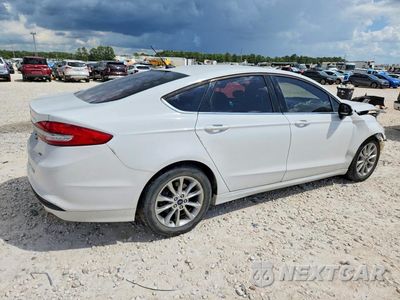 Trzecie zdjęcie samochodu z tyłu: 2017 FORD FUSION SE VIN:3FA6P0H7XHR235627 - miniatura