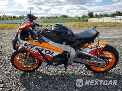 Trzecie zdjęcie samochodu z tyłu: 2015 HONDA CBR1000 SP VIN:JH2SC59M8FK700016 - miniatura