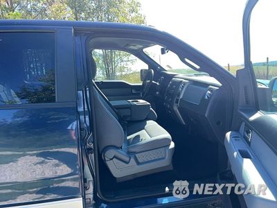 Piąte zdjęcie samochodu w środku: 2013 FORD F150 SUPERCREW VIN:1FTFW1CT4DFA01157 - miniatura