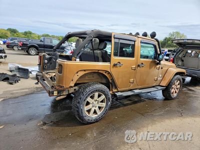 Trzecie zdjęcie samochodu z tyłu: 2011 JEEP WRANGLER UNLIMITED JEEP 70TH ANNIVERSARY VIN:1J4BA7H17BL603261 - miniatura