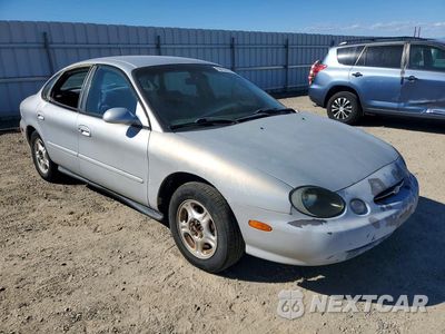 Czwarte zdjęcie samochodu z boku: 1999 FORD TAURUS SE VIN:1FAFP53U1XG111441 - miniatura