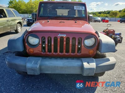 Piąte zdjęcie samochodu w środku: 2009 JEEP WRANGLER UNLIMITED X VIN:1J4GZ39149L726984 - miniatura