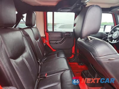 Zdjęcie 11 z 13 samochodu: 2014 JEEP WRANGLER UNLIMITED SAHARA VIN:1C4HJWEG0EL324418 - miniatura