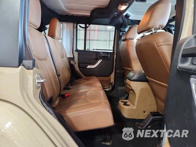 Zdjęcie 10 z 13 samochodu: 2017 JEEP WRANGLER UNLIMITED SAHARA VIN:1C4BJWEG0HL589236 - miniatura
