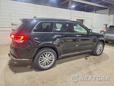 Trzecie zdjęcie samochodu z tyłu: 2017 JEEP GRAND CHEROKEE SUMMIT VIN:1C4RJFJT9HC844161 - miniatura