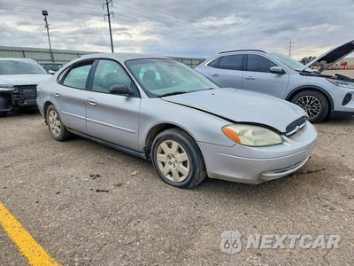 Czwarte zdjęcie samochodu z boku: 2002 FORD TAURUS LX VIN:1FAFP52292G210484 - miniatura