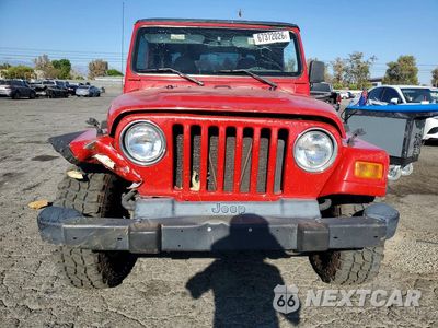 Piąte zdjęcie samochodu w środku: 2000 JEEP WRANGLER / TJ SE VIN:1J4FA29P3YP709571 - miniatura