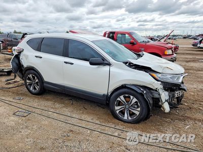 Czwarte zdjęcie samochodu z boku: 2018 HONDA CR-V LX VIN:5J6RW6H32JL002334 - miniatura