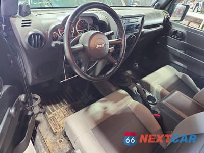 Zdjęcie 8 z 13 samochodu: 2010 JEEP WRANGLER SPORT VIN:1J4AA2D16AL202478 - miniatura