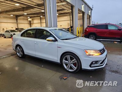 Czwarte zdjęcie samochodu z boku: 2016 VOLKSWAGEN JETTA GLI VIN:3VW5T7AJ8GM236624 - miniatura