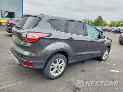 Trzecie zdjęcie samochodu z tyłu: 2017 FORD ESCAPE SE VIN:1FMCU9GD2HUD66637 - miniatura