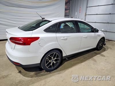 Trzecie zdjęcie samochodu z tyłu: 2017 FORD FOCUS SEL VIN:1FADP3H23HL213917 - miniatura