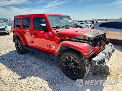 Czwarte zdjęcie samochodu z boku: 2021 JEEP WRANGLER UNLIMITED SAHARA 4XE VIN:1C4JJXP64MW858370 - miniatura