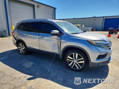 Czwarte zdjęcie samochodu z boku: 2016 HONDA PILOT ELITE VIN:5FNYF6H02GB121360 - miniatura