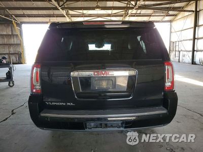 Zdjęcie 6 z 13 samochodu: 2015 GMC YUKON XL DENALI VIN:1GKS1JKJ5FR309571 - miniatura