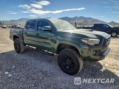 Czwarte zdjęcie samochodu z boku: 2021 TOYOTA TACOMA TRD SPORT VIN:5TFCZ5AN9MX279908 - miniatura