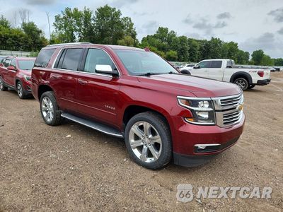 Czwarte zdjęcie samochodu z boku: 2017 CHEVROLET TAHOE K1500 PREMIER VIN:1GNSKCKC4HR114190 - miniatura