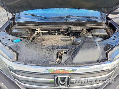 Zdjęcie 12 z 13 samochodu: 2016 HONDA PILOT EXL VIN:5FNYF6H58GB103702 - miniatura